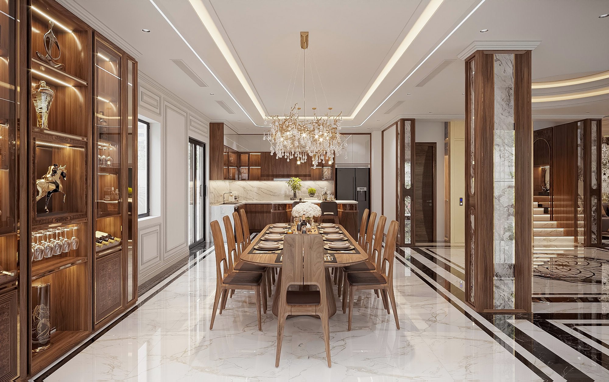 thiết kế thi công nội thất nhà phố phòng bếp với bàn ăn oval gỗ óc chó và tủ bếp chữ L